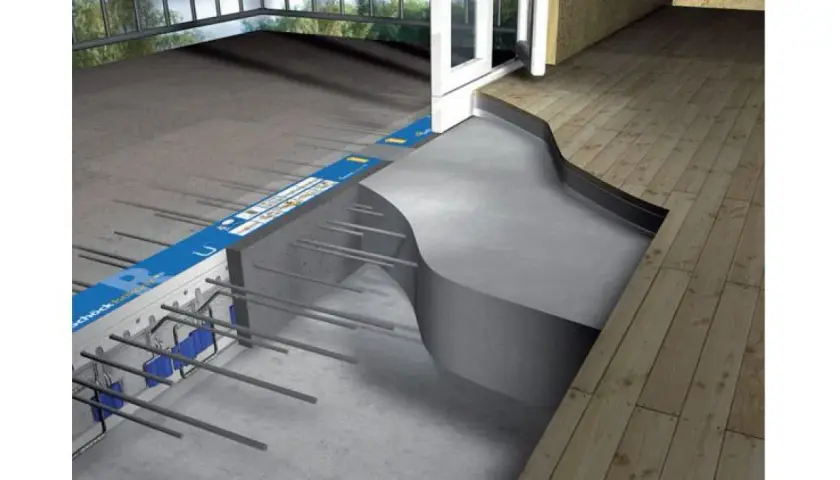 Izolacja termiczna i akustyczna przy budowie balkonu. Widoczny system profili i zbrojenia, jak zazbroić balkon, by był energooszczędny.